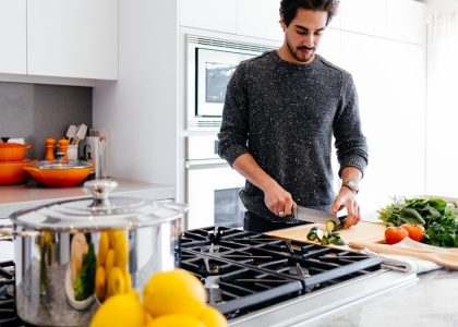man cutting vegetables
